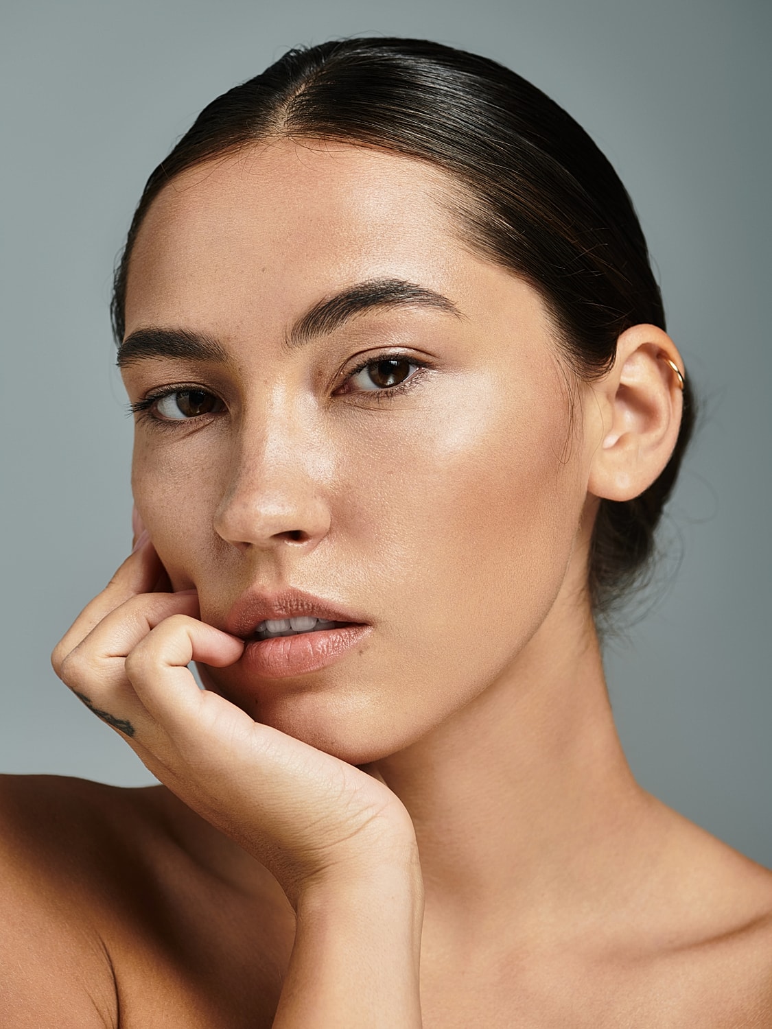Close-up portrait of a woman with natural beauty.